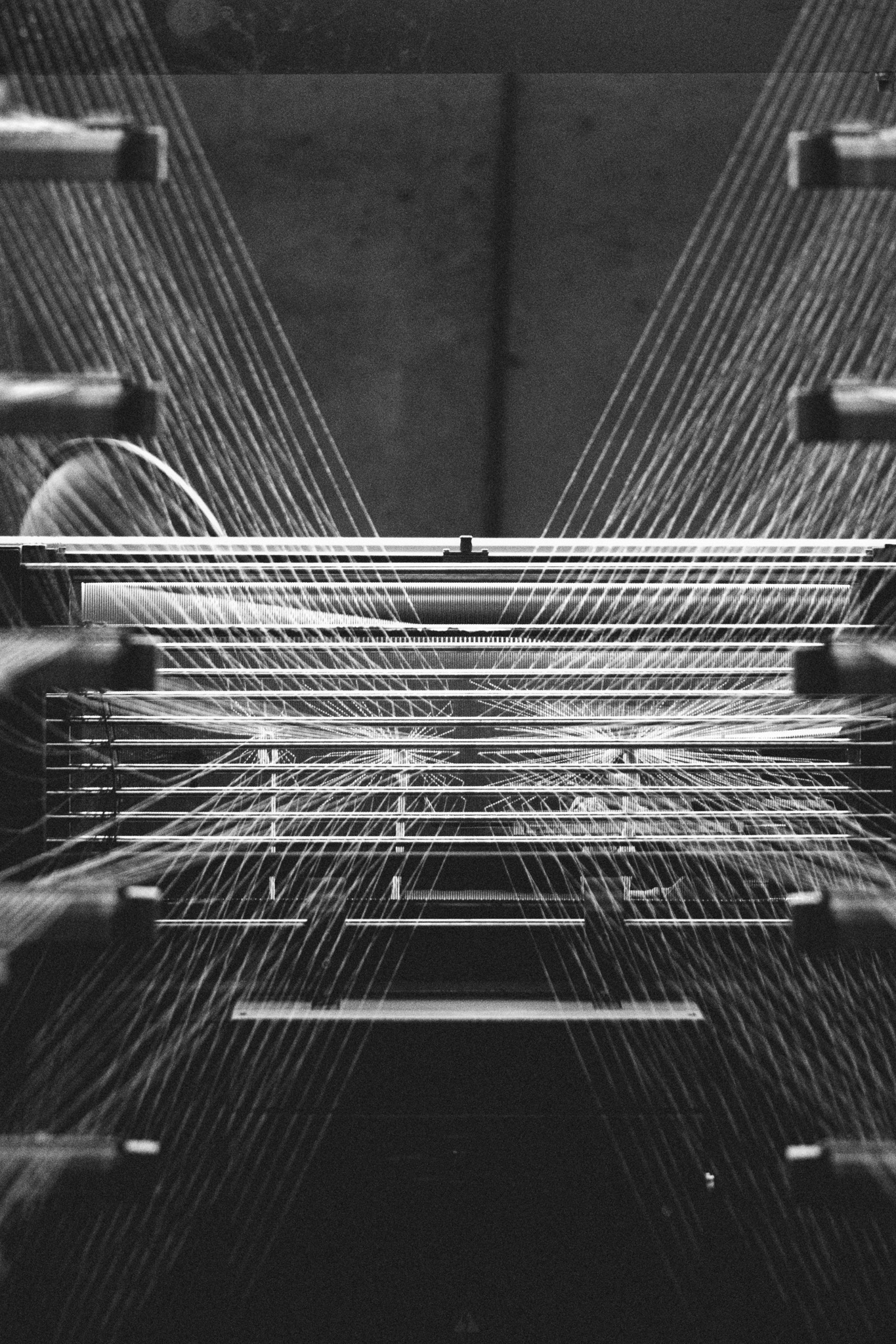 Textile factory machine weaving close up